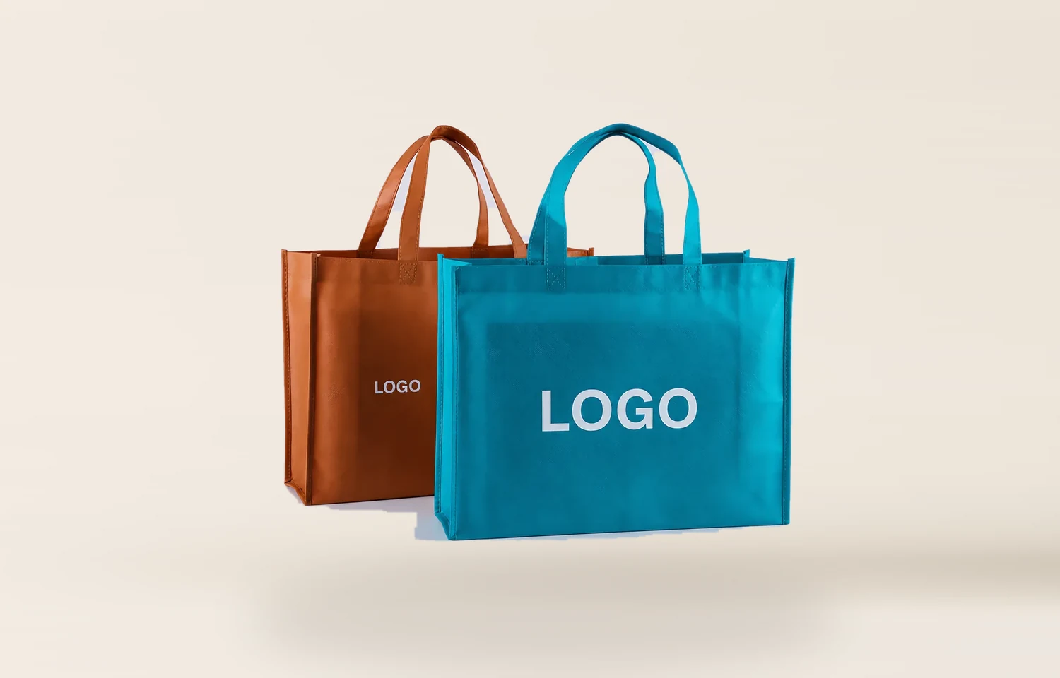 Teal and brown non-woven shopping bags against a warm cream backdrop